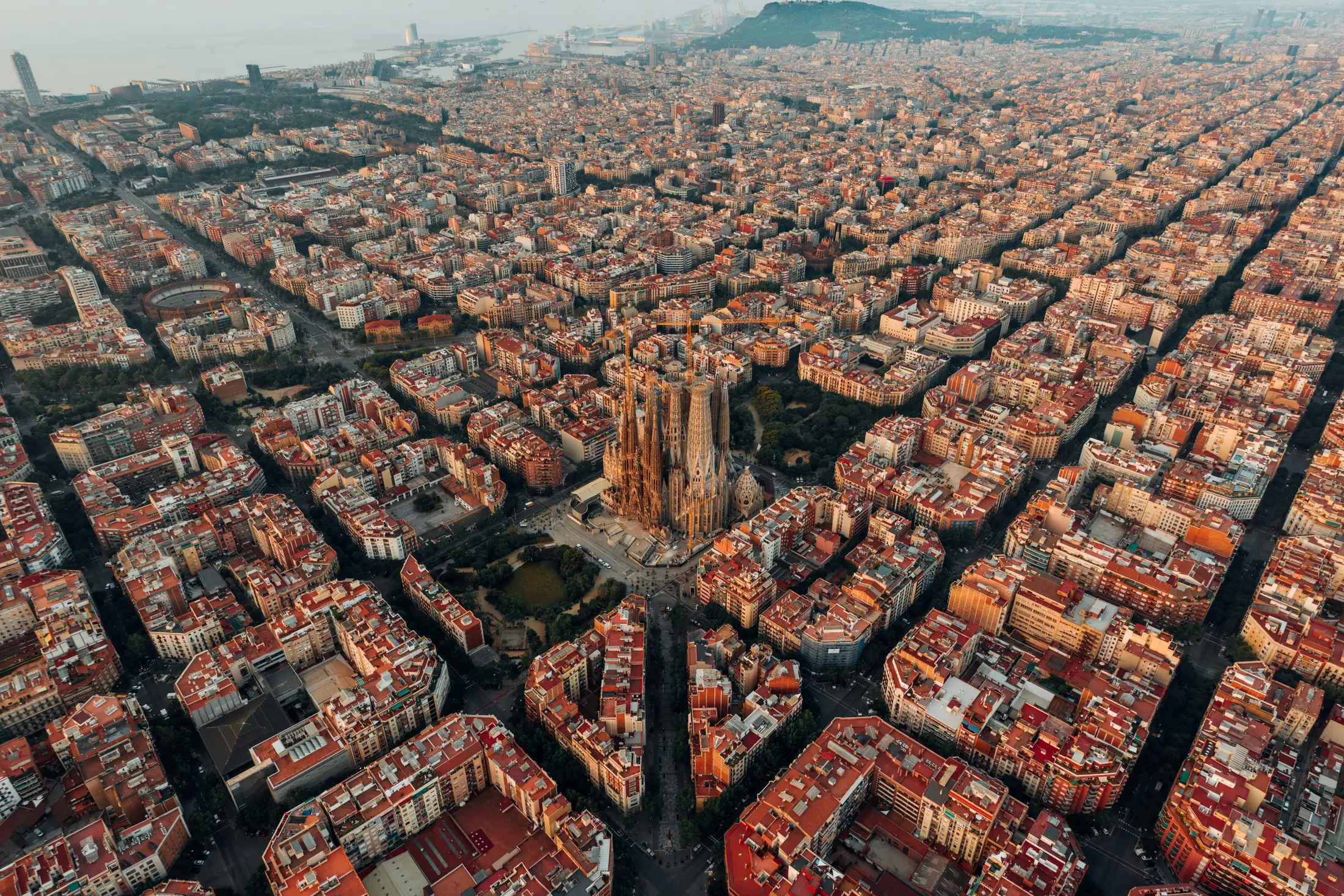 Aerial view of Barcelona's Eixample grid with the Sagrada Família